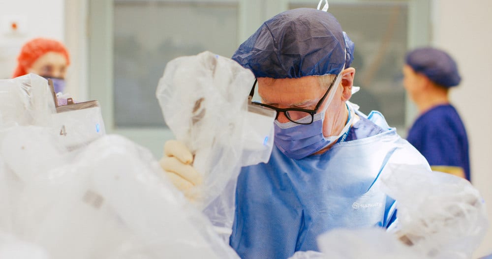 Professor Costello on a Surgery using Da Vinci